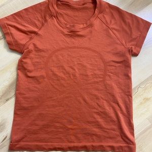 lululemon burnt orange shirt